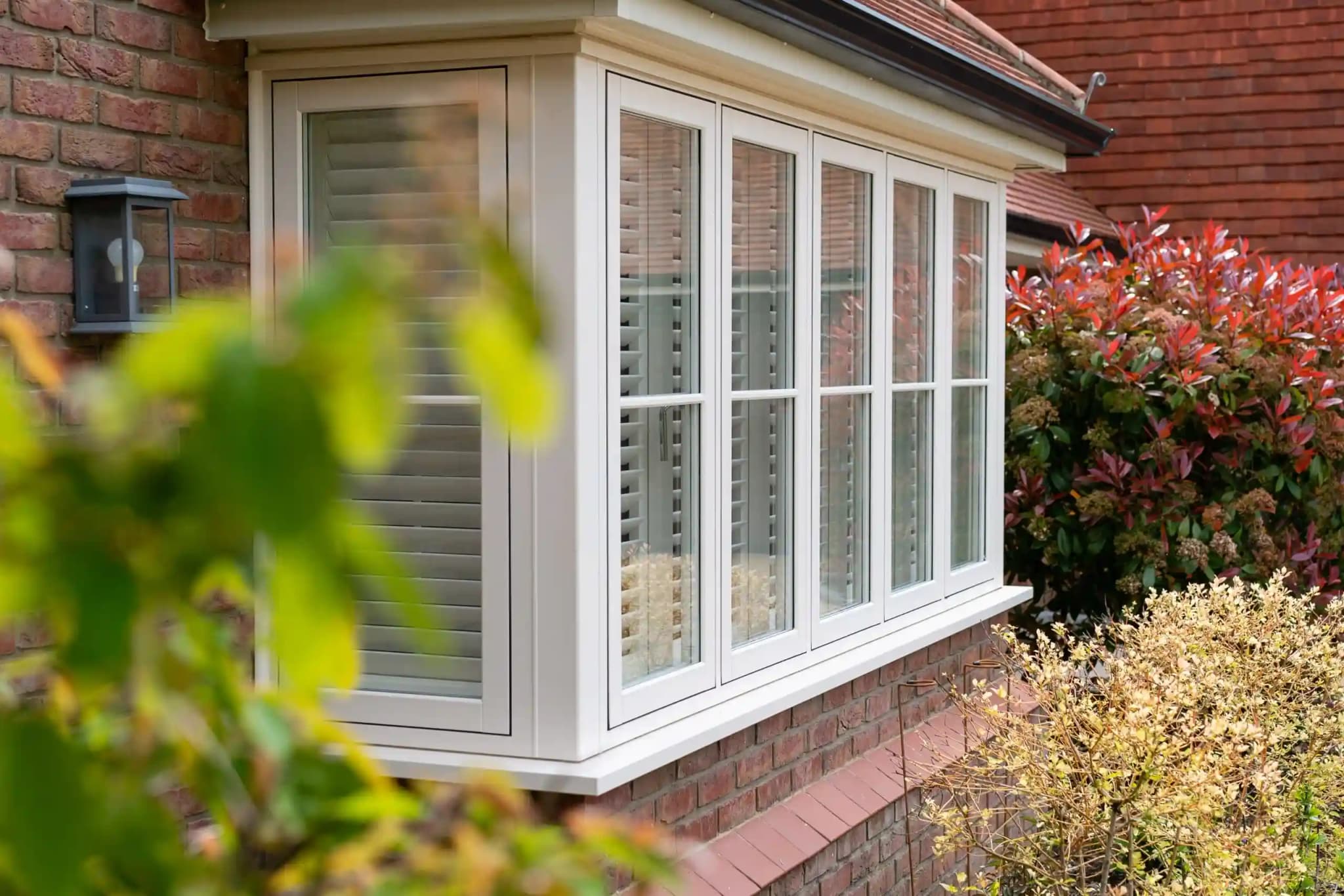 Elegant bay window installation in a period property showing internal wooden finish