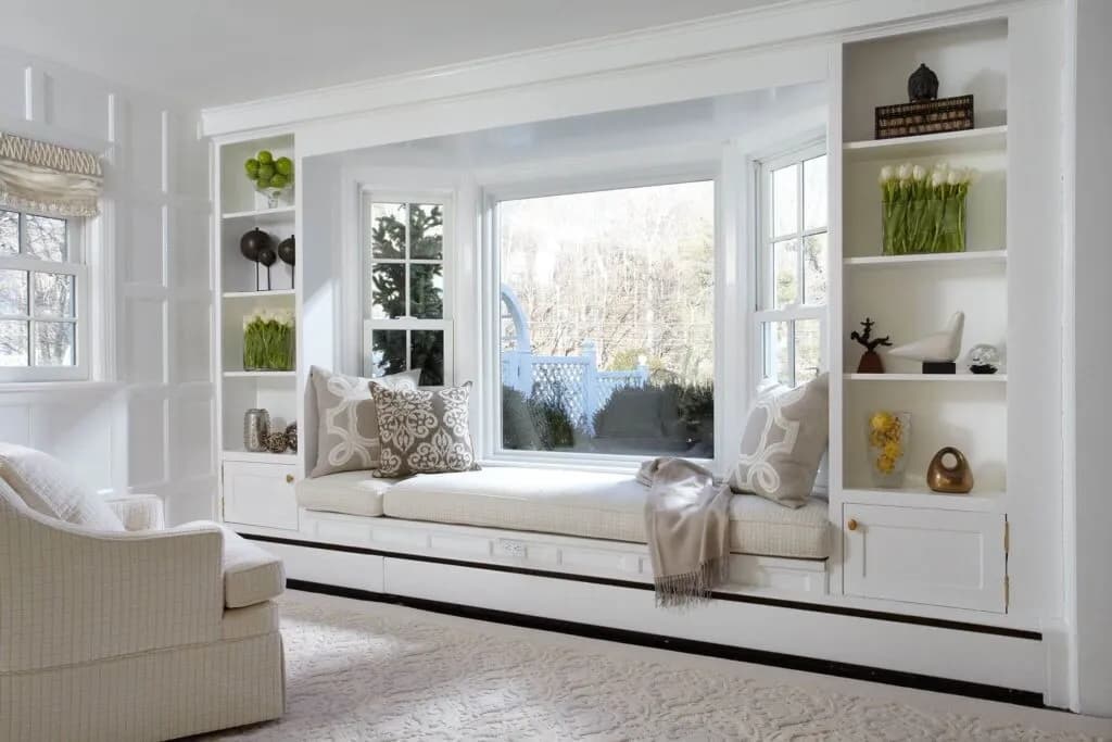 Bay window allowing abundant natural light into a bright, airy room with panoramic views