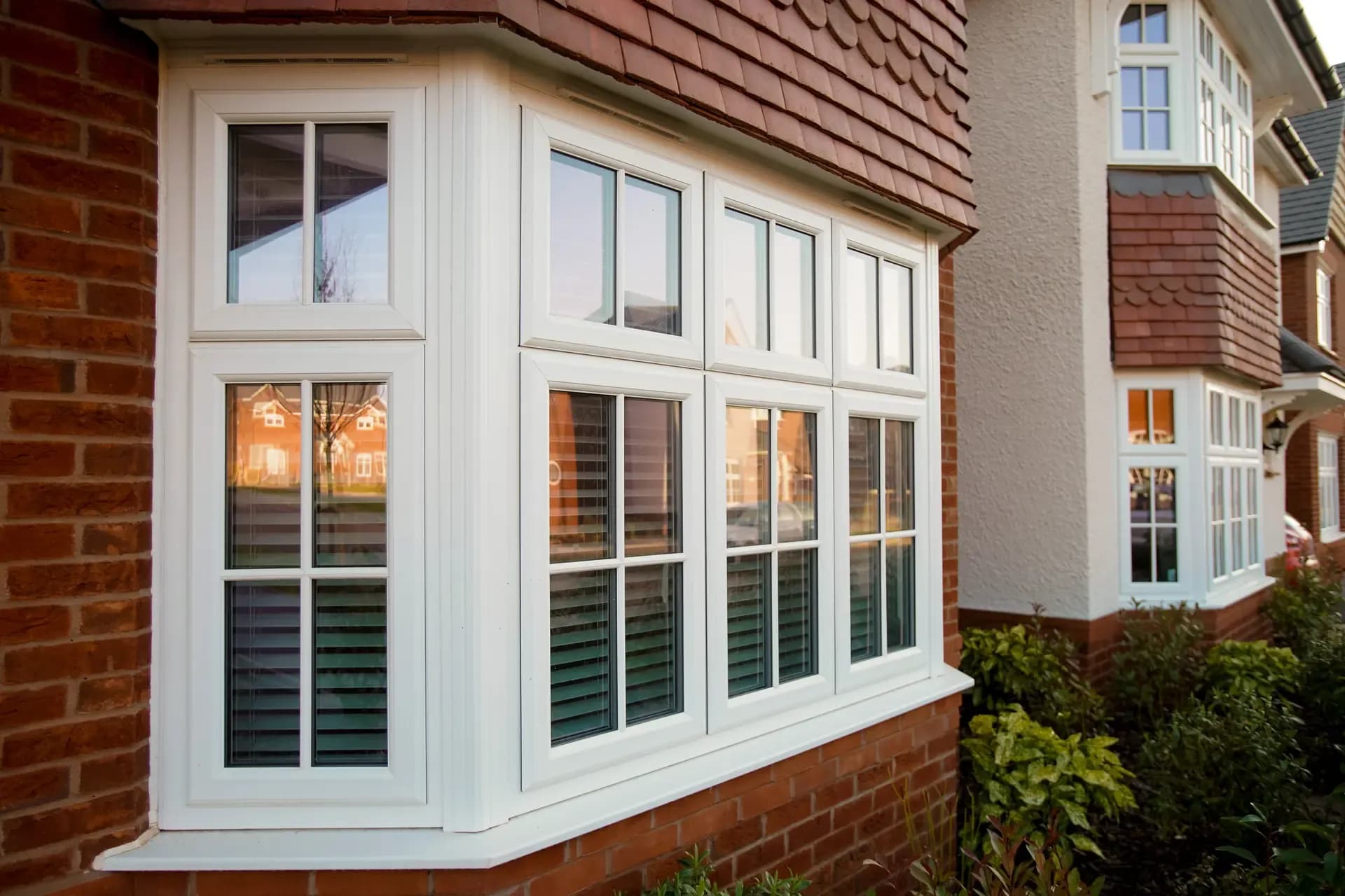 Bay window exterior showcasing elegant architectural detail and enhanced curb appeal
