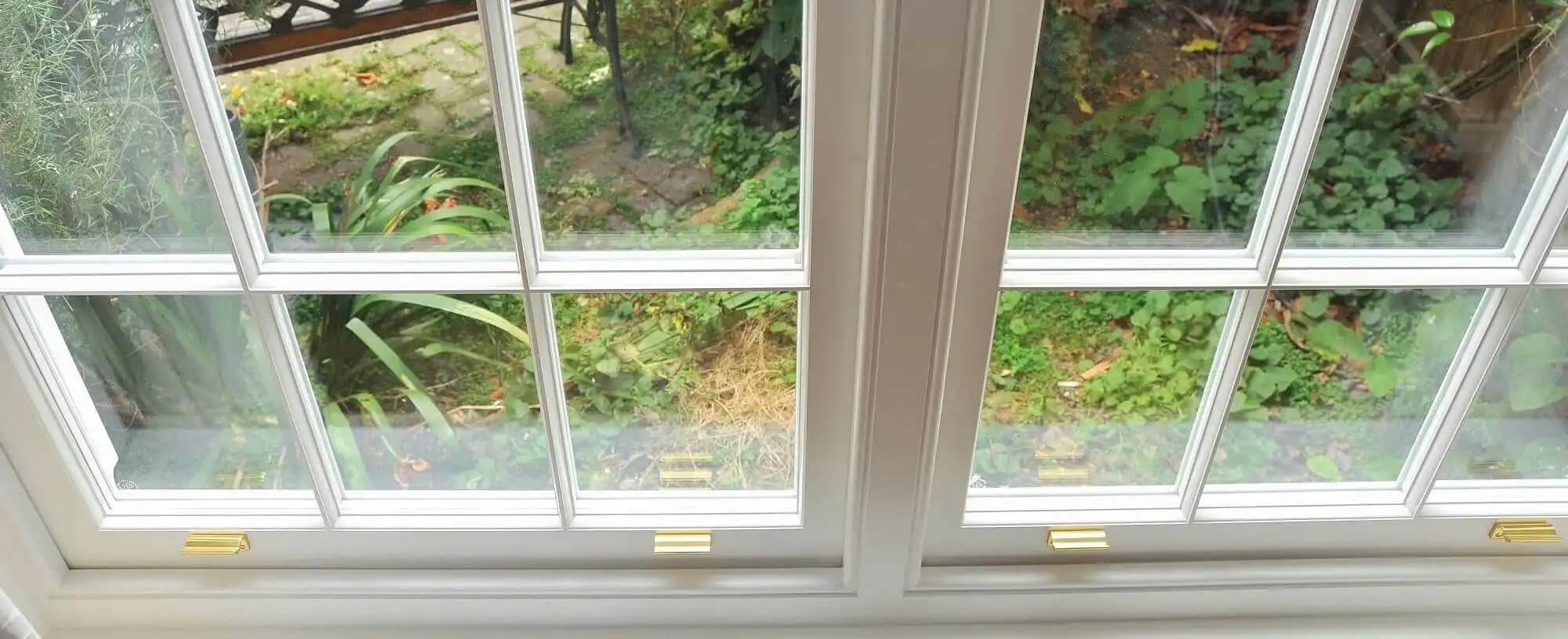 A-rated energy efficient double glazed window with thermal efficiency diagram showing heat retention properties
