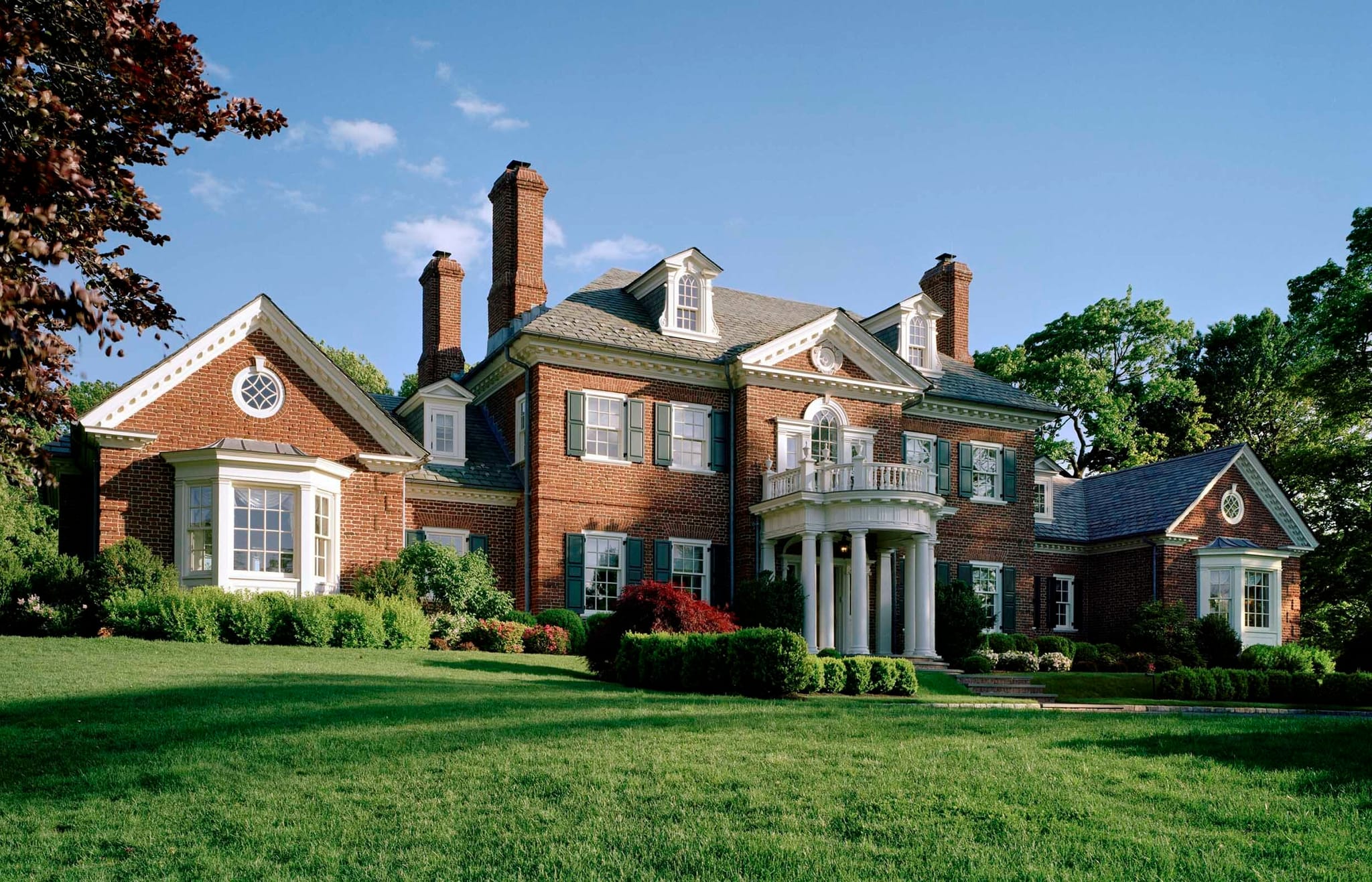 large house windows, floor-to-ceiling windows, bay and bow windows, picture windows, sliding windows, large windows UK, modern large windows, large window installation, corner windows, large house window styles
